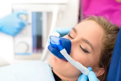 patient asleep during a dental procedure thanks to sedation